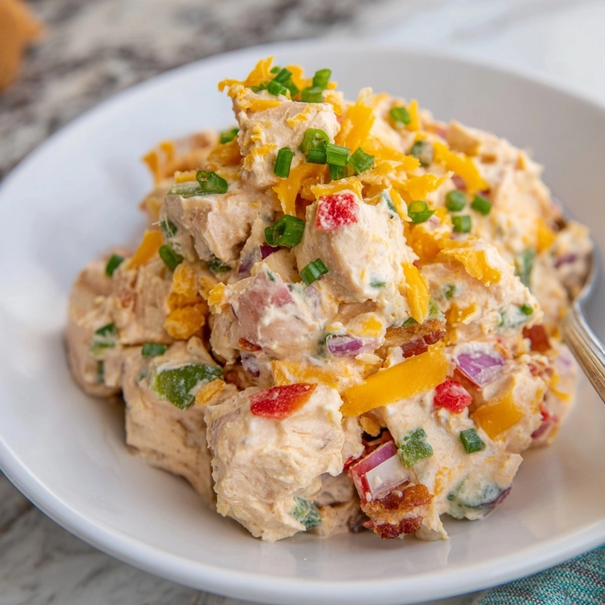 Close-up of spicy Jalape&amp;ntilde;o Popper Chicken Salad, perfect for sandwiches or a light lunch.