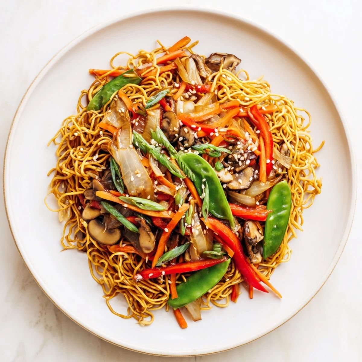 View a close-up of the delicious Crispy Noodle, featuring flavorful stir-fry sauce and toppings.