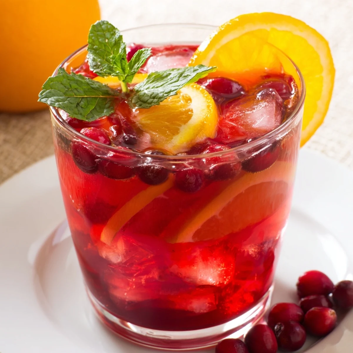 Enjoy the bright, red color of this homemade Cranberry Punch, perfect for a summer day.