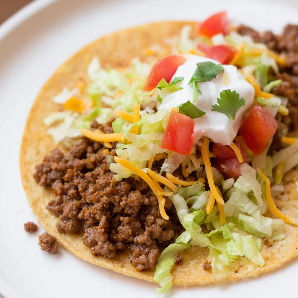 Close-up of perfectly seasoned beef tacos in warm tortillas, ideal for a delicious Mexican dinner.