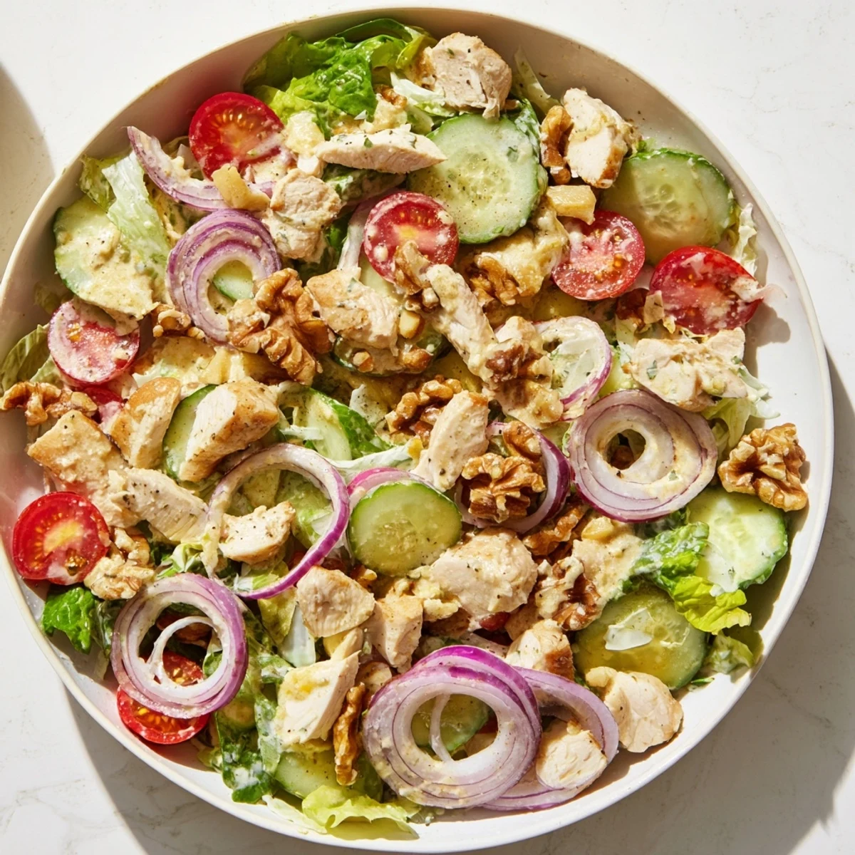Creamy chicken salad with crunchy vegetables, ready to serve as a satisfying main dish.