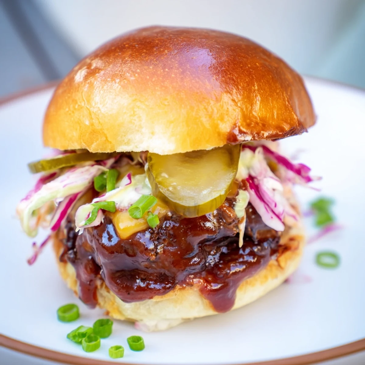 Freshly toasted Big Game BBQ Beef Sliders on Brioche served on a platter for game day.