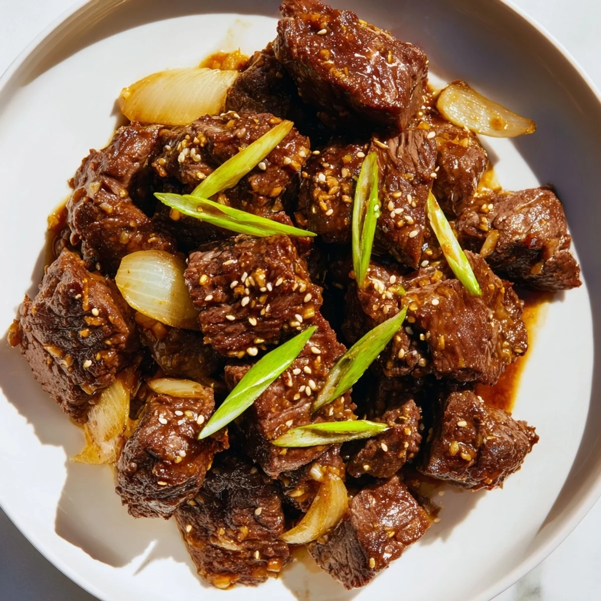 A family-style serving of slow-cooked Korean Beef, showcasing the rich, glossy sauce, ready to be scooped into lettuce wraps.