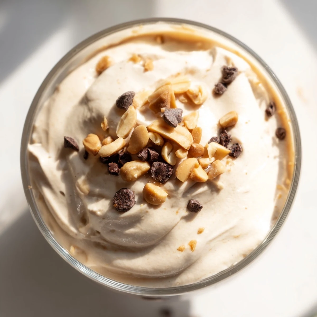 Fluffy peanut butter and Cool Whip mousse topped with chocolate shavings