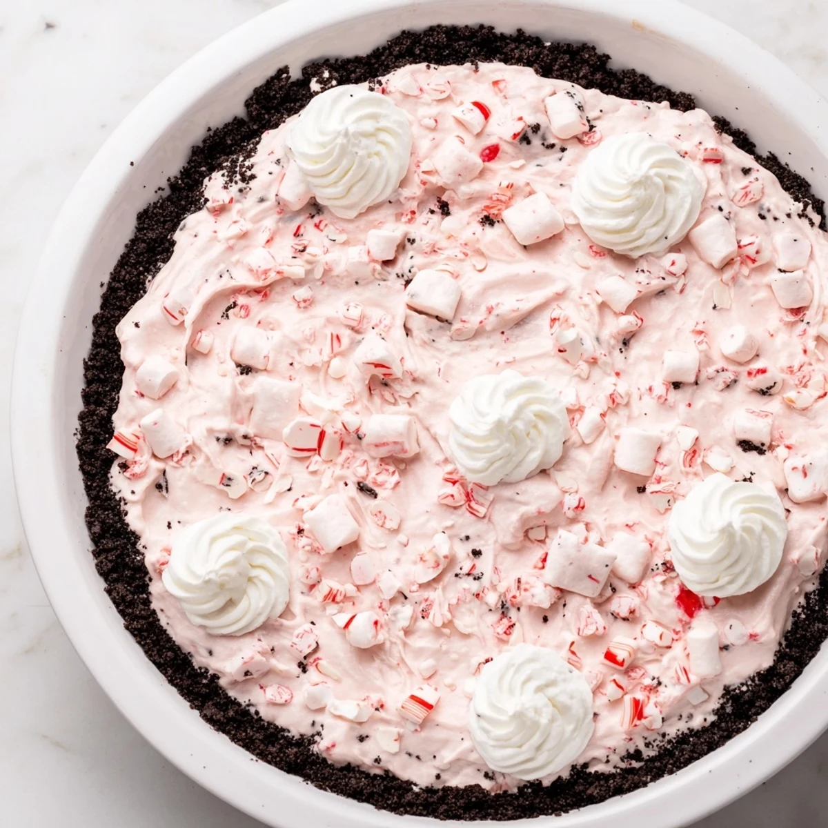 Festive Candy Cane Pie on holiday table, cool peppermint aroma, ready to serve