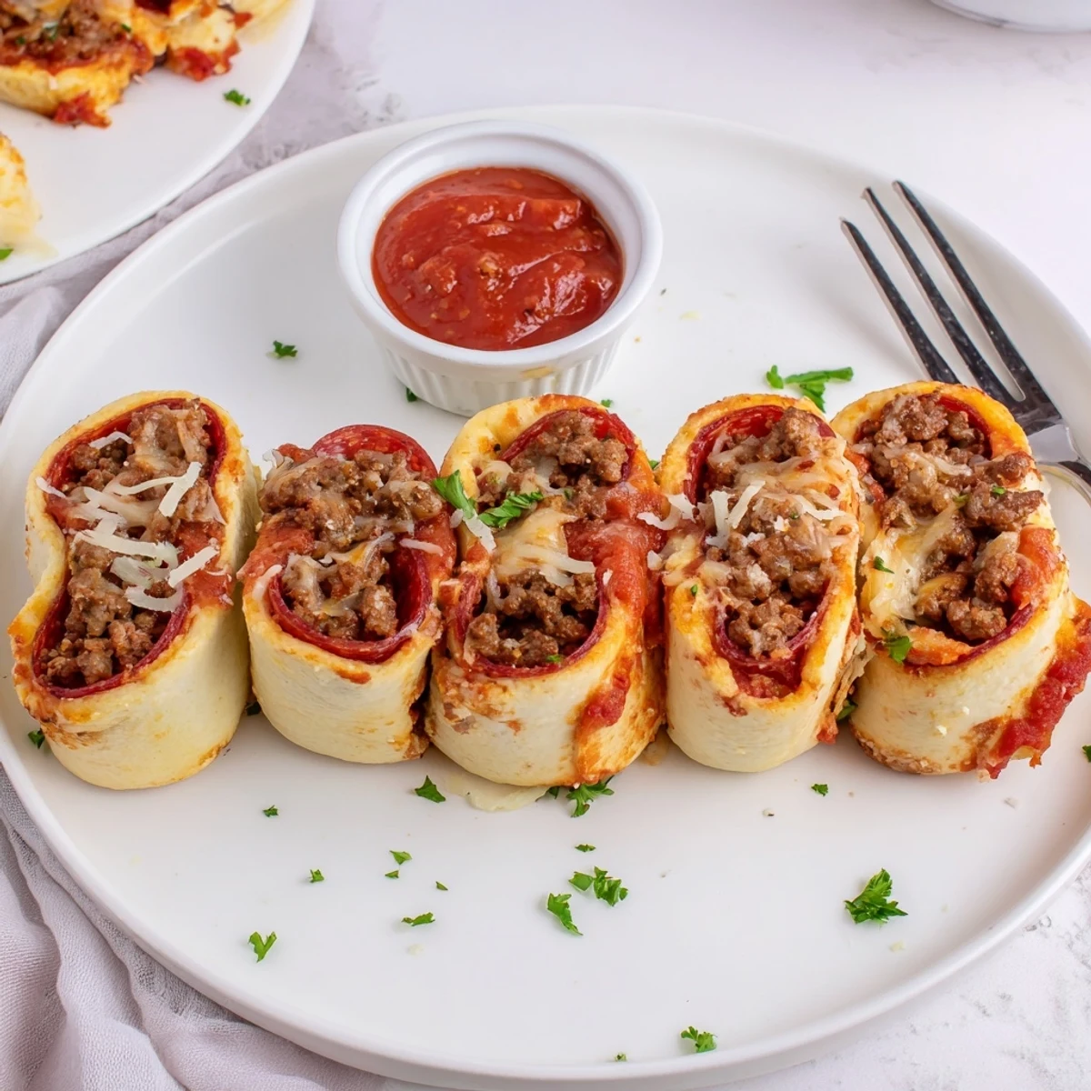 Cheesy Beef Pepperoni Pizza Roll Ups Snack Recipe perfect for parties, savory handheld bites  