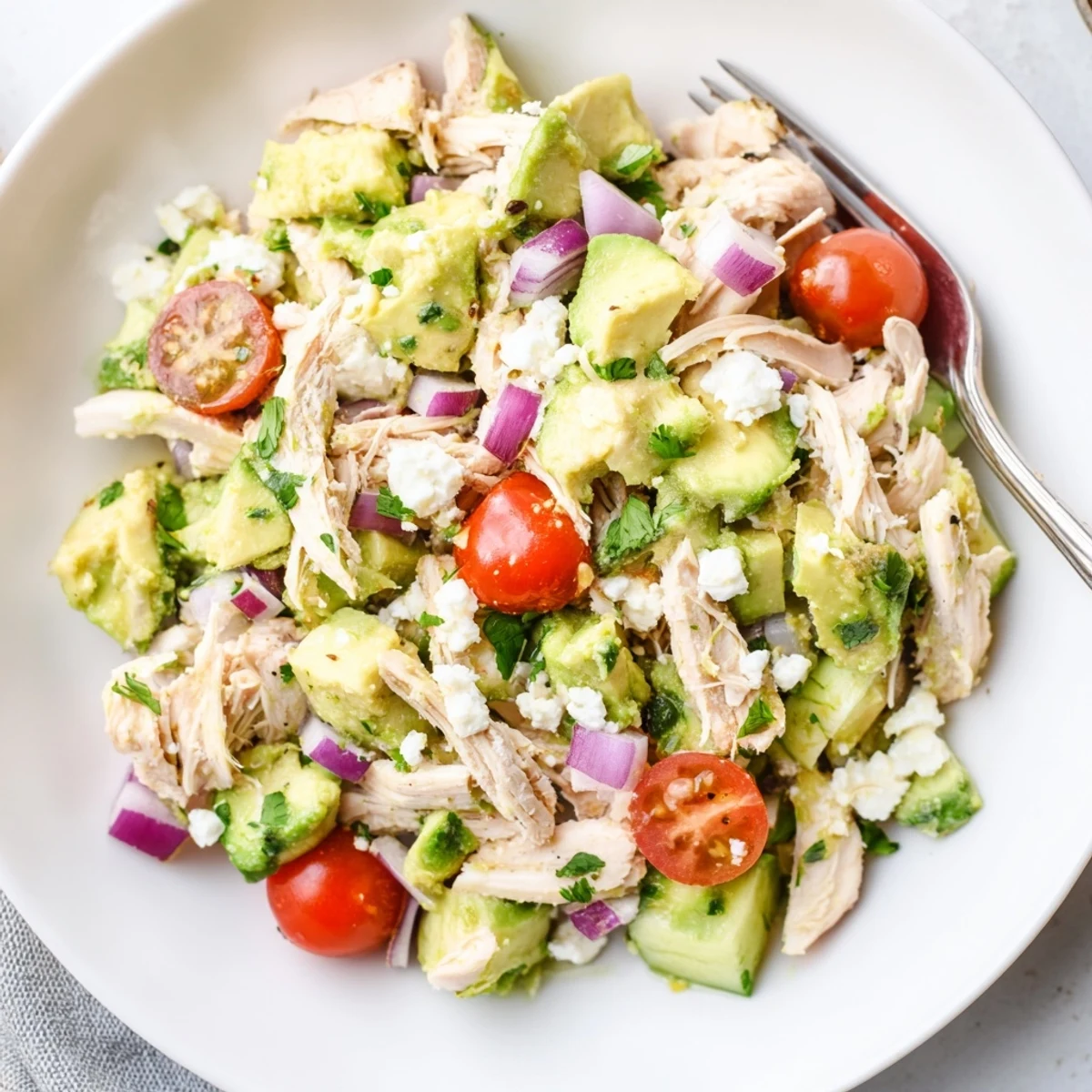 Avocado Chicken Salad with shredded chicken, creamy avocado, bright lime dressing