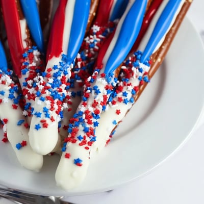 Plate of Patriotic Pretzel Rods arranged for a Fourth of July picnic.